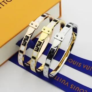 Louis Vuitton Brazalete Hinged Dorada Negra Inlay de Esmalte