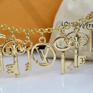 Louis Vuitton Gold Metal Multi-Charm Necklace