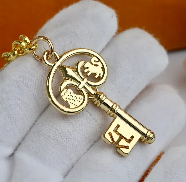 Louis Vuitton Gold Metal Multi-Charm Necklace 4