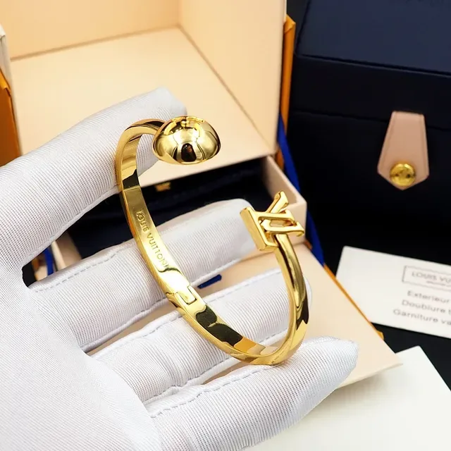 Louis Vuitton Gold-Tone Floral Sphere LV Clasp Bangle Bracelet 4
