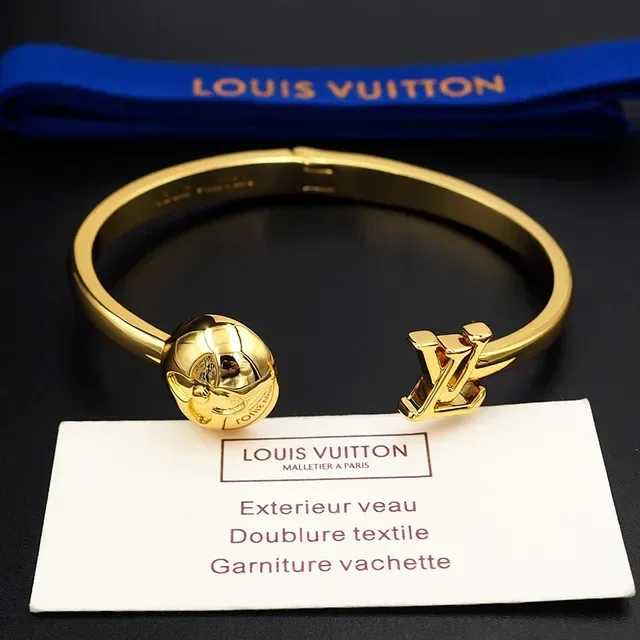Louis Vuitton Gold-Tone Floral Sphere LV Clasp Bangle Bracelet 6