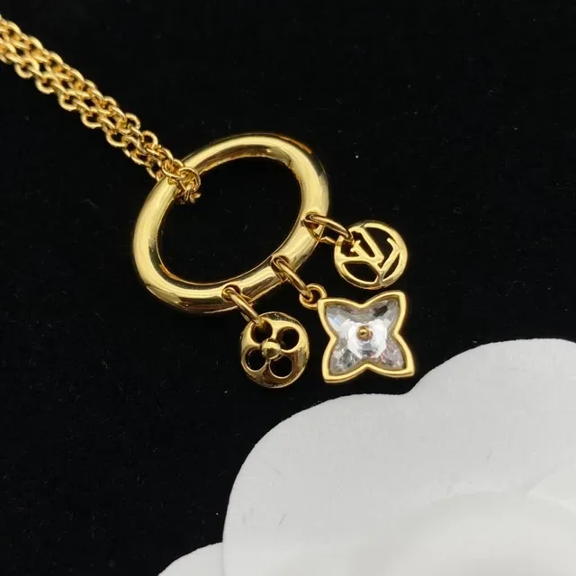 Louis Vuitton Gold Transparent Charm-Dangling Earrings 2