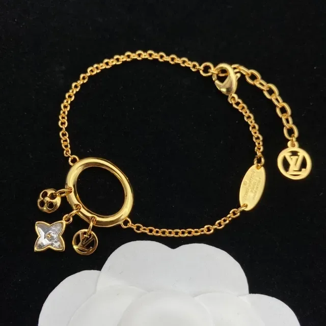 Louis Vuitton Gold Transparent Charm-Dangling Earrings 3