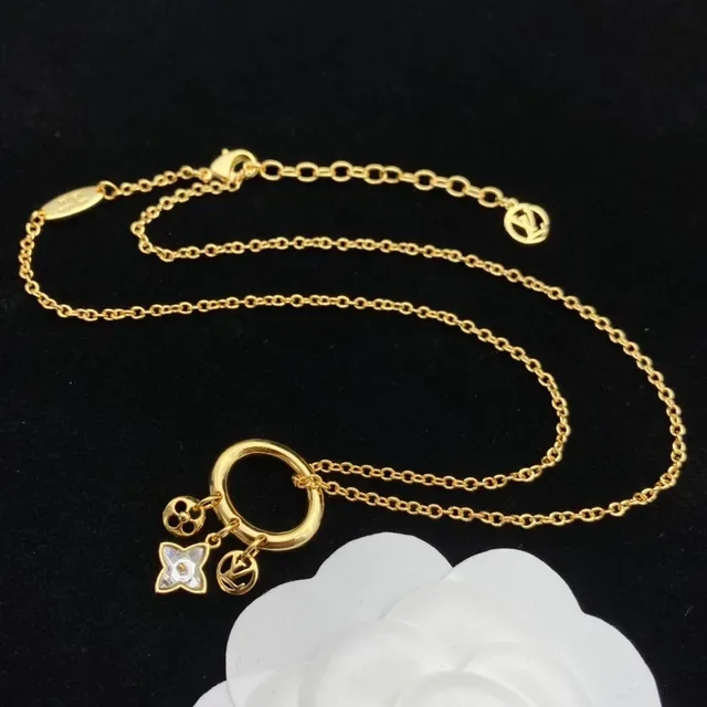 Louis Vuitton Gold Transparent Charm-Dangling Earrings 6