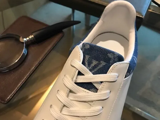 Louis Vuitton LV Trainer White Navy Leather Upper Monogrammed Denim Heel Tab Lifestyle Sneakers 8