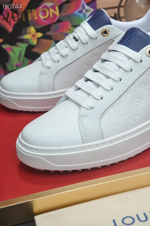 Louis Vuitton LV Trainer White Navy Low-Top Monogram-Embossed Leather Lifestyle Sneakers 4
