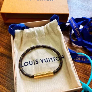 Louis Vuitton Monogram pulsera marrón dorado cuero abrazadera cilíndrica