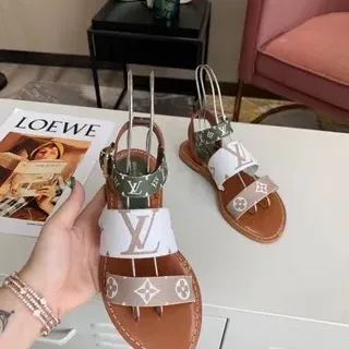 Louis Vuitton مونوغرام مطبوع متعدد الحزام صنادل مسطحة كاجوال