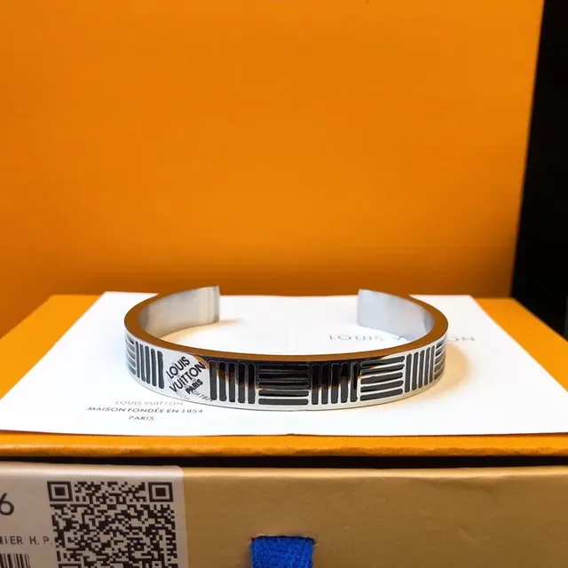 Louis Vuitton Monogram Stripe Engraved Silver-Tone Cuff Bracelet 9