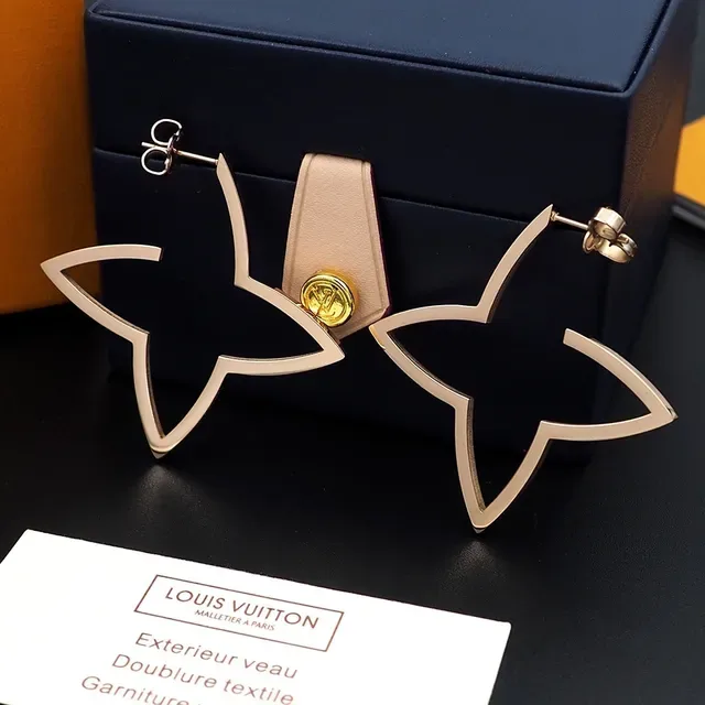 Louis Vuitton Star Gold Outline Hollow Geometric Earrings 2