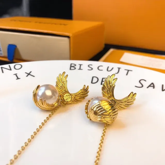 Louis Vuitton Winged Pearl Drop Earrings 6