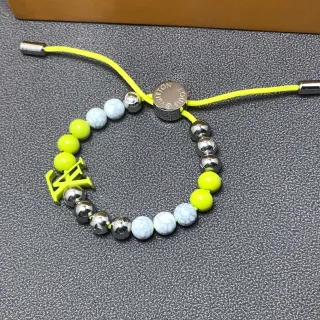 Louis Vuitton pulsera amarilla blanca ajustable cierre de cordón perlas de material mixto