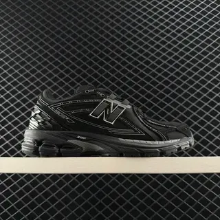 New Balance 2002R Black Silver Retro Running Silhouette Layered Synthetic Overlays Lifestyle Sneakers