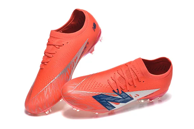New Balance Chaussures de football terrain ferme orange bleu low-cut upper ajustement chaussette système de lacets asymétrique 2