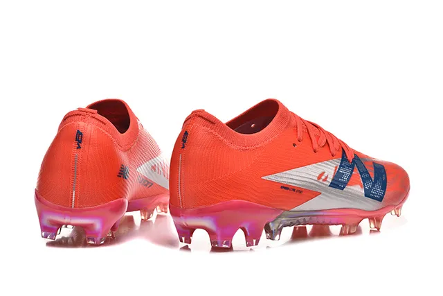 New Balance Chaussures de football terrain ferme orange bleu low-cut upper ajustement chaussette système de lacets asymétrique 5