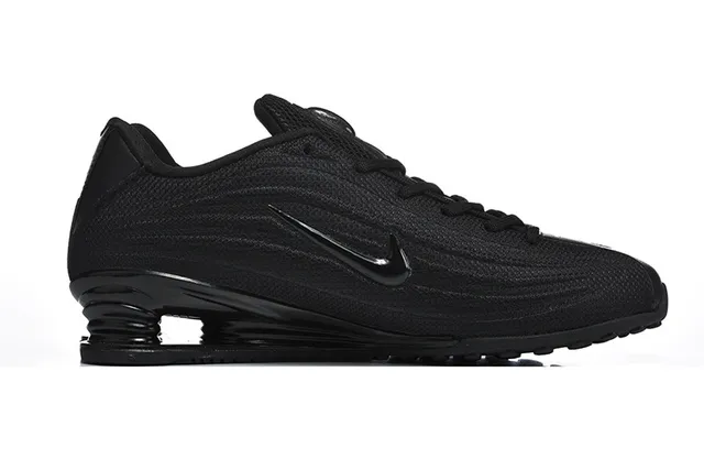 Nike Black Knit Upper Sculpted Wavy Midsole Lifestyle Sneakers 2
