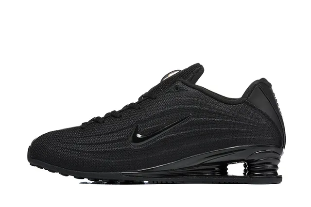 Nike Black Knit Upper Sculpted Wavy Midsole Lifestyle Sneakers 6