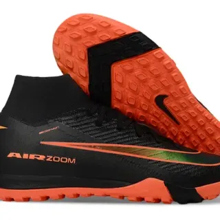 Nike Zapatillas de fútbol turf negro y naranja con cuello sock-fit y upper knit texturizado