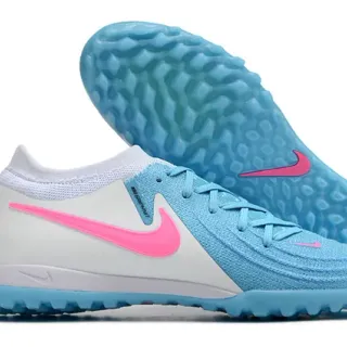 Nike Sapatos de futebol Turf Flyknit azul e rosa com cadarços assimétricos