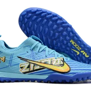 Nike Zapatillas de Fútbol Turf con Upper Flyknit Ligero Azul y Amarillo con Overlay Gráfico Vibrante