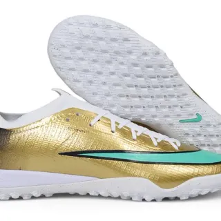 Nike Zapatos de fútbol turf con parte superior sintética metálica dorado y azul talón degradado