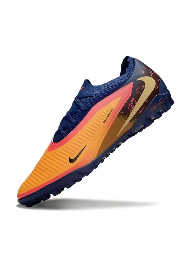 Nike Chaussures de football low-cut avec upper en knit synthétique color bleu marine orange semelle Reactx cushioned pour gazon artificiel 3