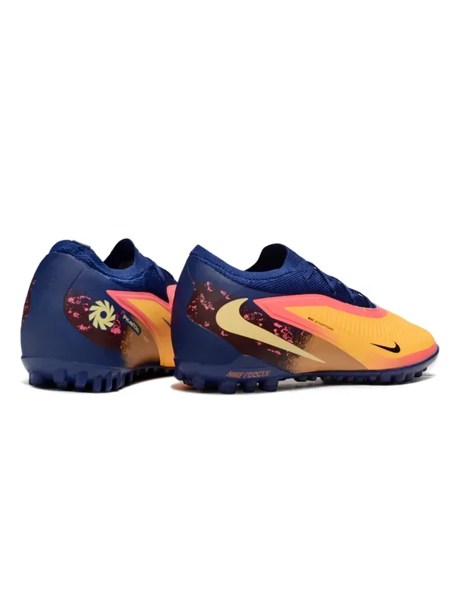 Nike Chaussures de football low-cut avec upper en knit synthétique color bleu marine orange semelle Reactx cushioned pour gazon artificiel 5