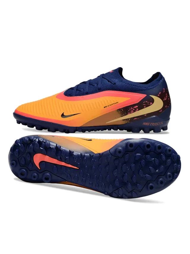 Nike Chaussures de football low-cut avec upper en knit synthétique color bleu marine orange semelle Reactx cushioned pour gazon artificiel 6