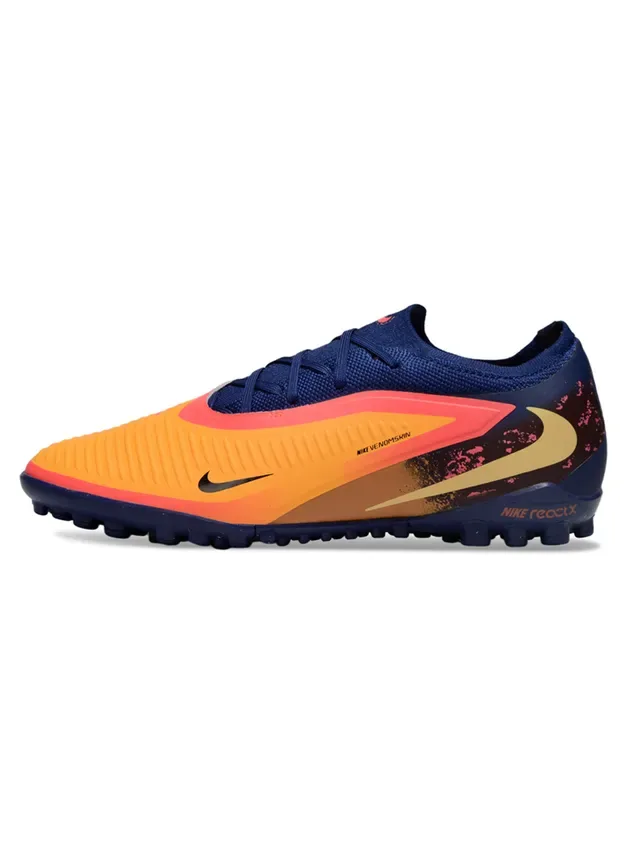 Nike Chaussures de football low-cut avec upper en knit synthétique color bleu marine orange semelle Reactx cushioned pour gazon artificiel 7