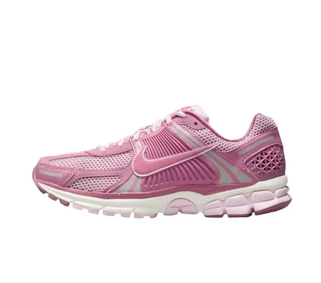 Nike Chaussures de course rose blanc maille superposition synthétique construction panneaux latéraux côtelés 6
