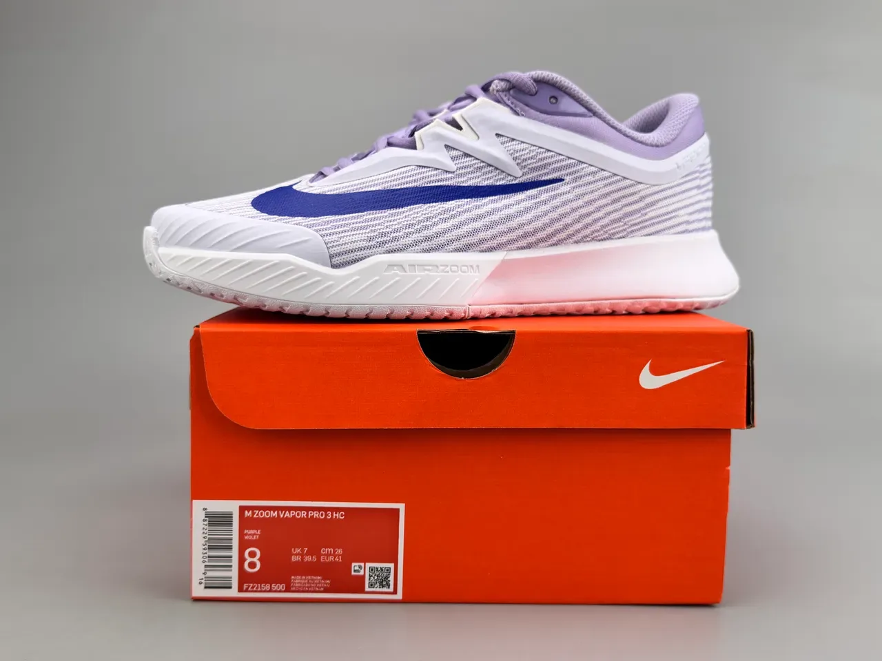 Nike Vapor Chaussures de running blanches et violettes avec upper en tricot et semelle Air Zoom 4