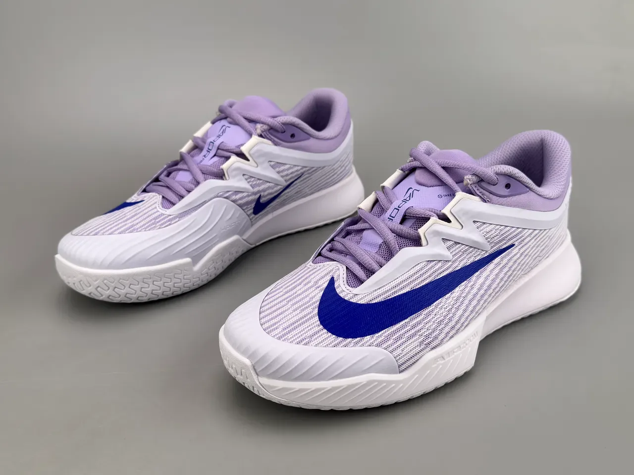 Nike Vapor Chaussures de running blanches et violettes avec upper en tricot et semelle Air Zoom 7