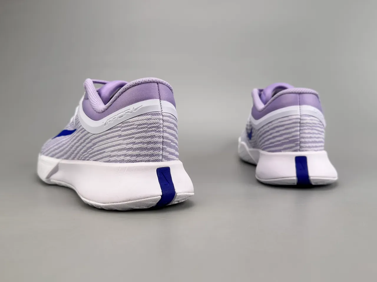 Nike Vapor Chaussures de running blanches et violettes avec upper en tricot et semelle Air Zoom 8