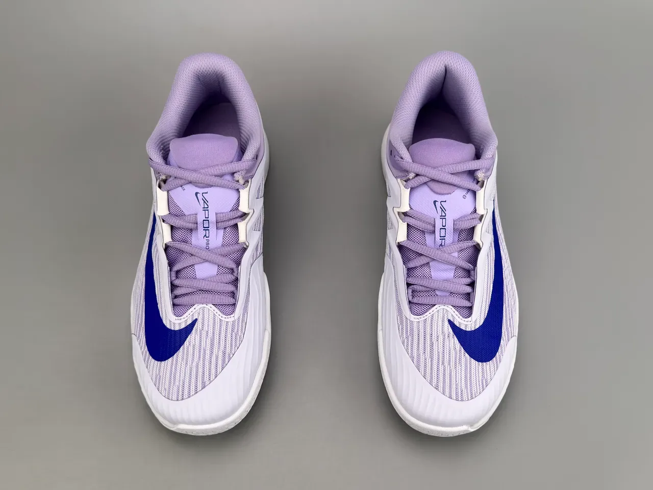 Nike Vapor Chaussures de running blanches et violettes avec upper en tricot et semelle Air Zoom 9