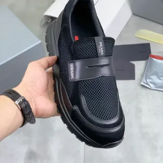 Prada Cloudbust কালো মেশ এবং সুড স্লিপ-অন লাইফস্টাইল স্নিকার