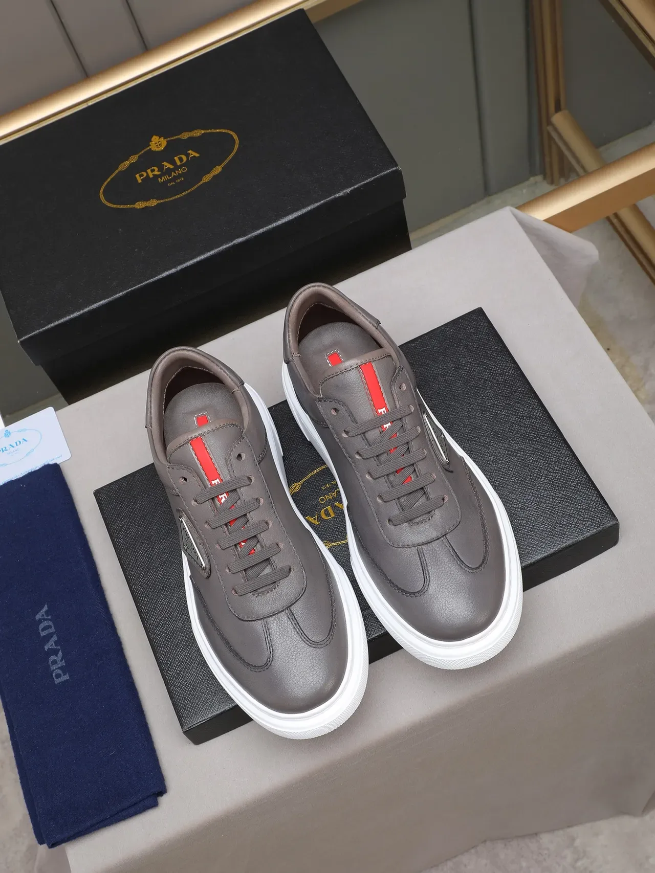 Prada Cloudbust Gray White Leather Upper Triangular Metal Logo Patch Lifestyle Sneakers 2