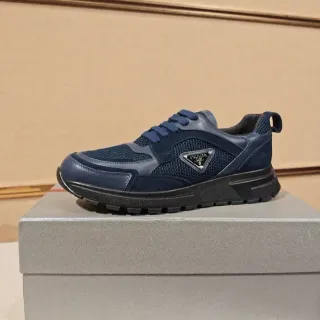 Prada Cloudbust أزرق بحري أسود شبيكي وجلد بناء اللوحات لوحة الشعار المثلثية حذاء رياضي أسلوب حياة