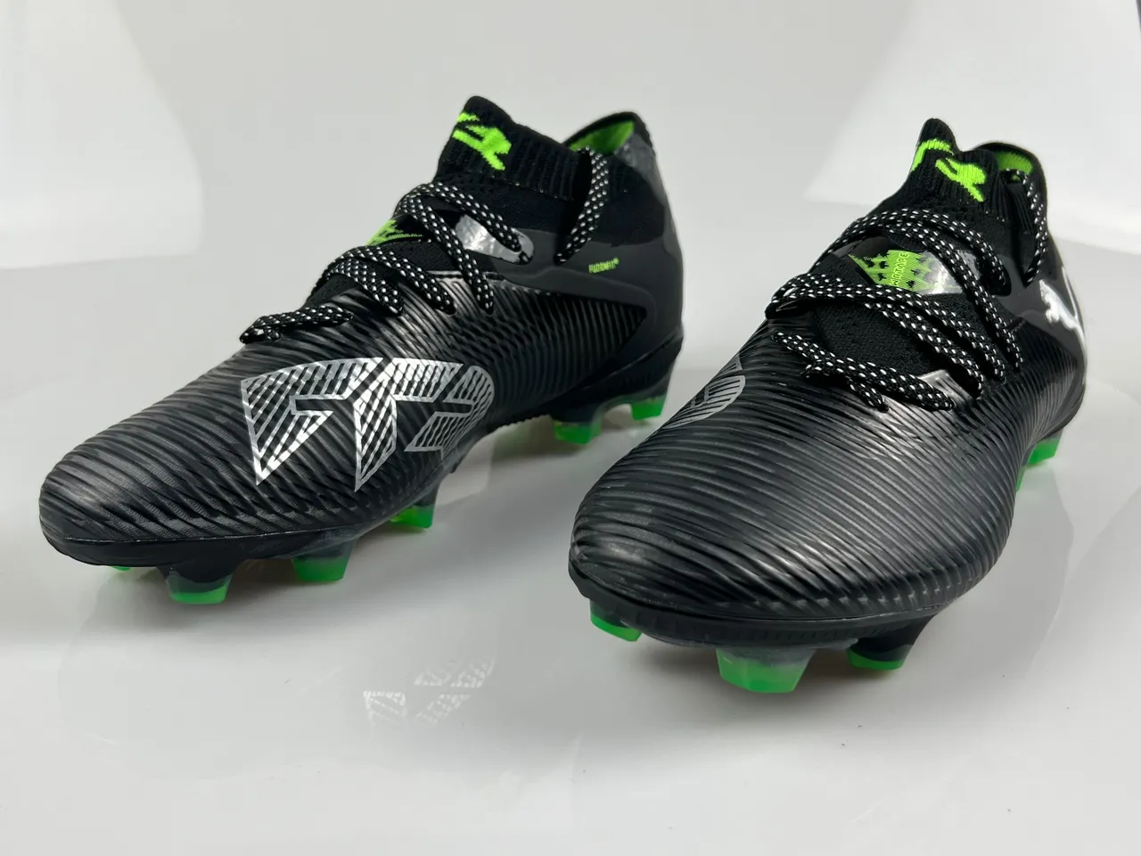 Puma Future Z Black and Green Firm-Ground Chaussures de football 12