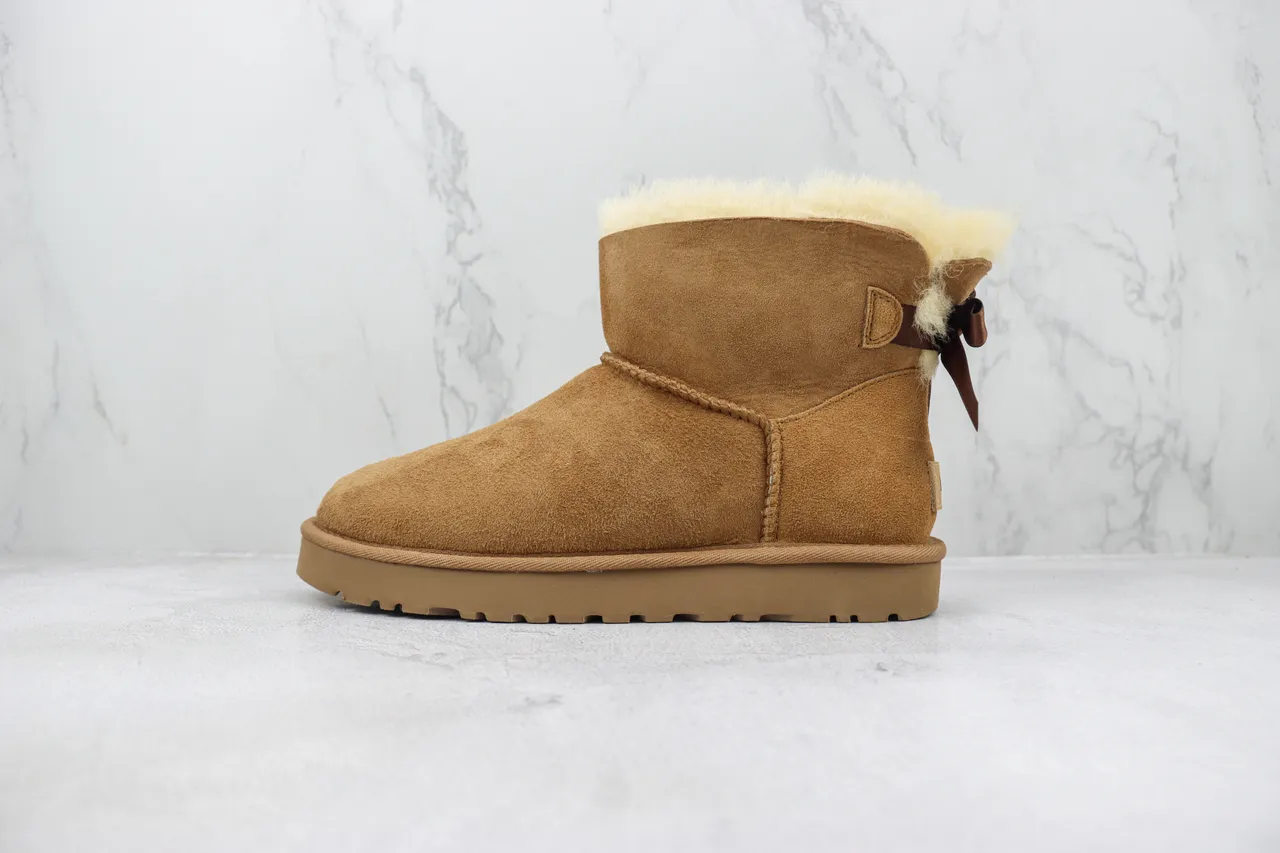 UGG Classic Mini Bow Tan Suede Shearling-Lined Snow Boots 2