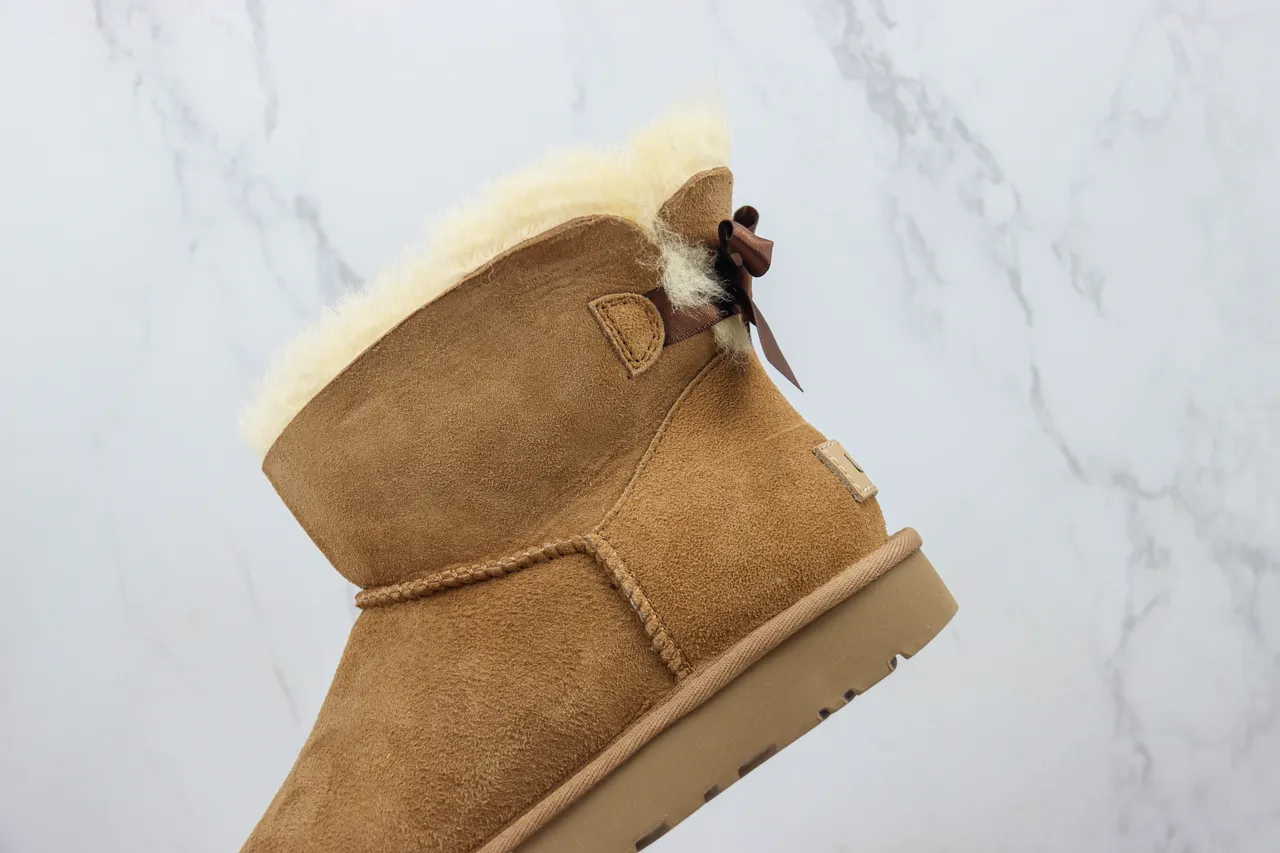 UGG Classic Mini Bow Tan Suede Shearling-Lined Snow Boots 9